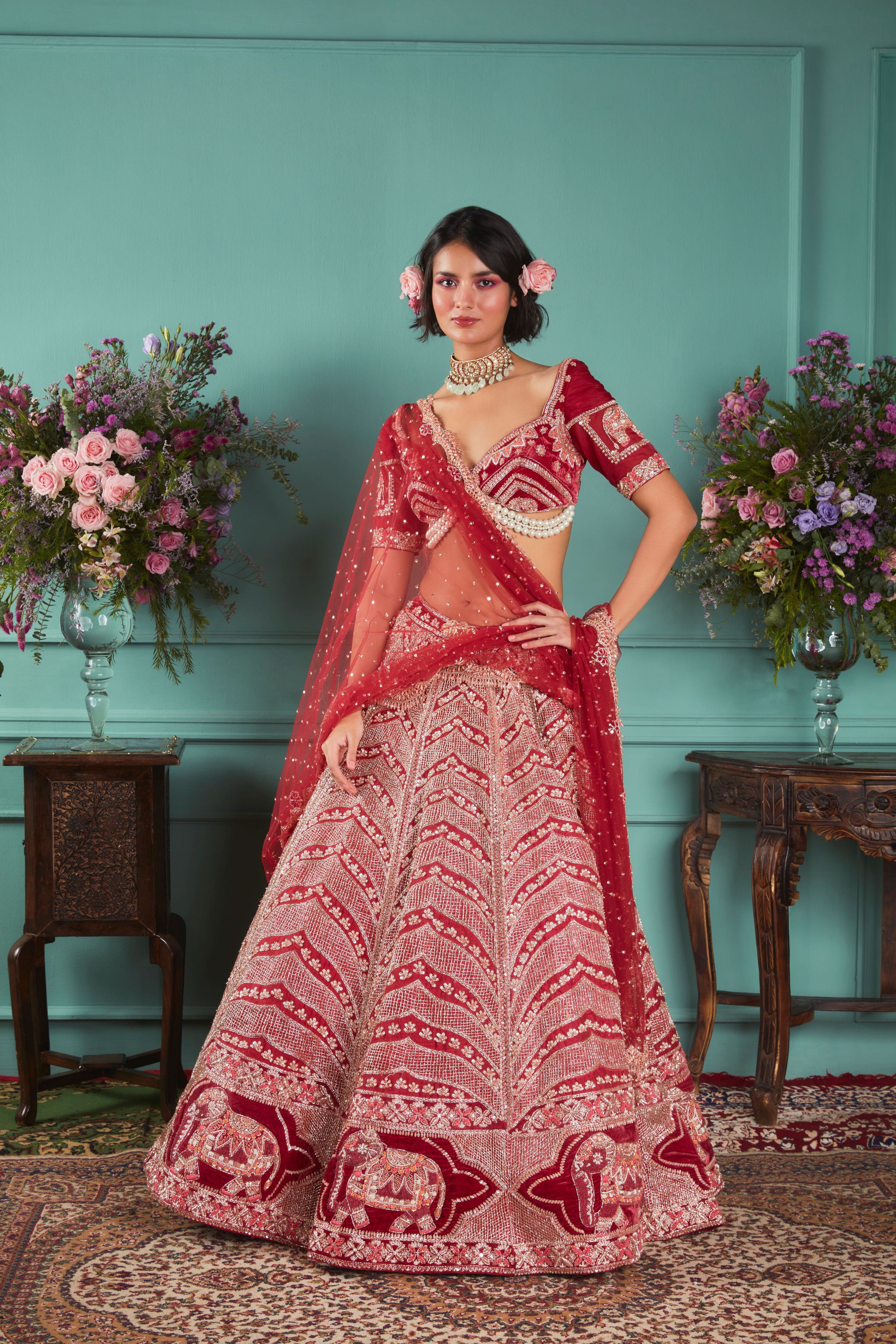 RED LEHENGA WITH ELEPHANT ELEMENTS