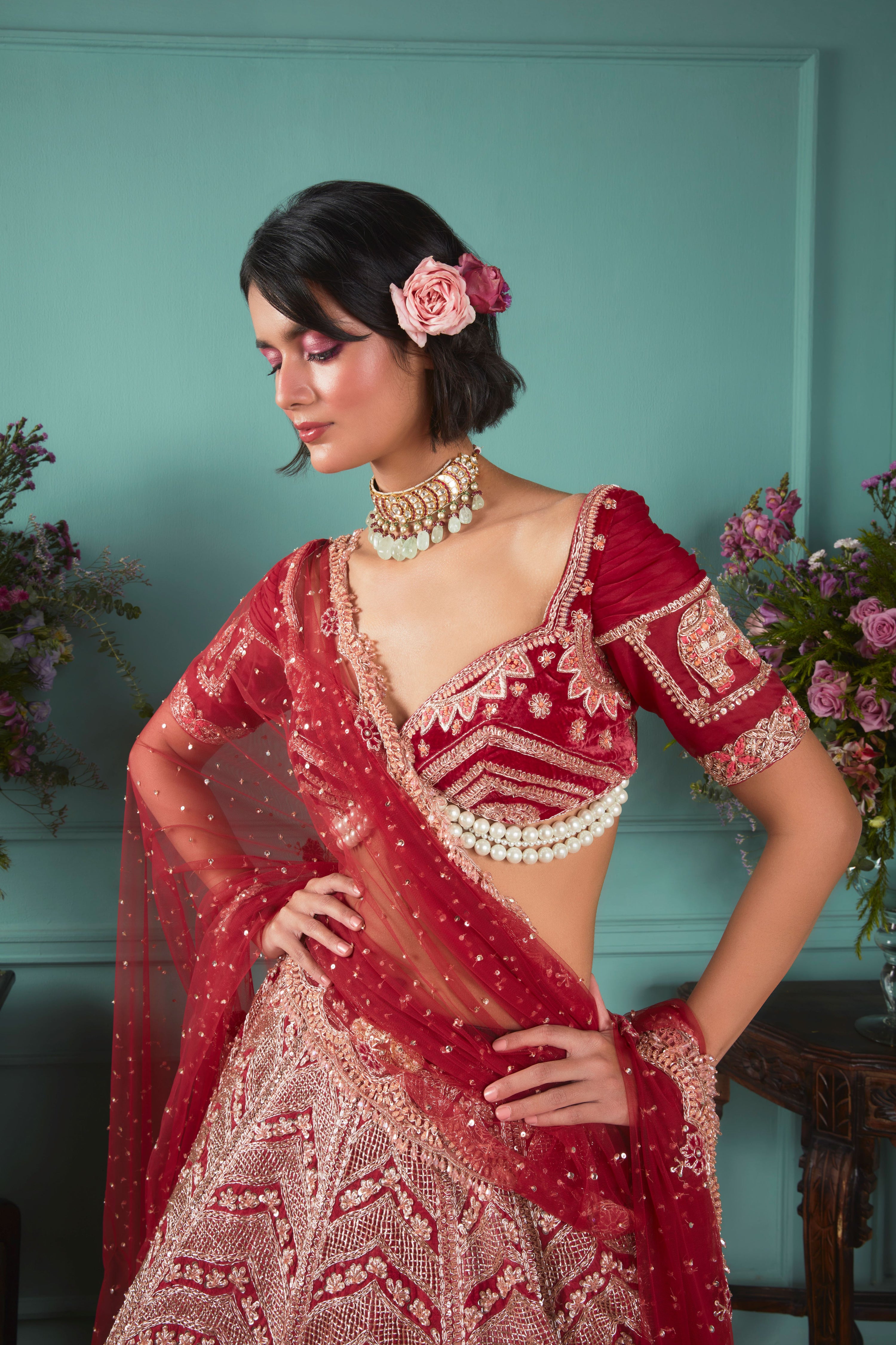 RED LEHENGA WITH ELEPHANT ELEMENTS