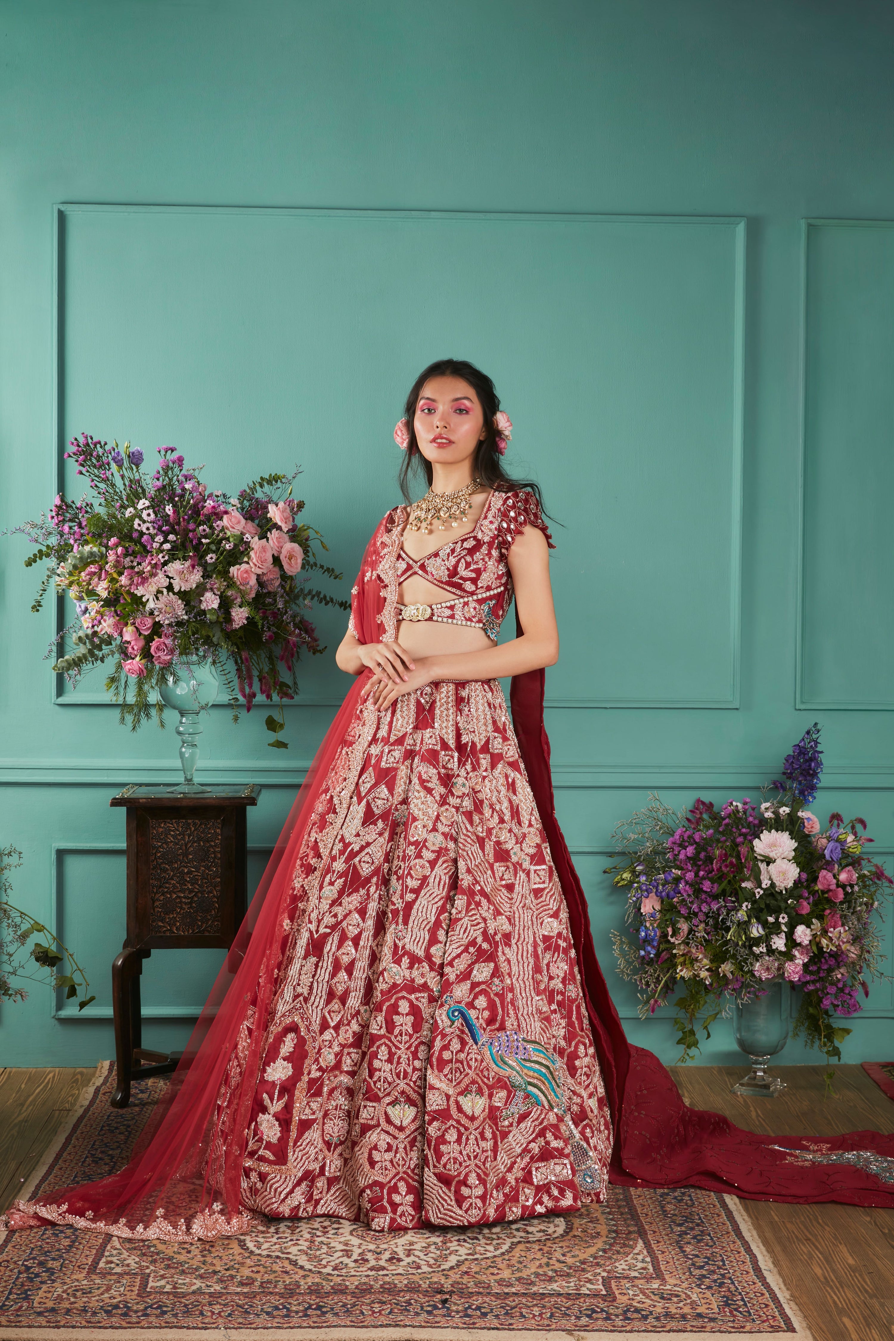 RED LEHENGA WITH PEACOCKS