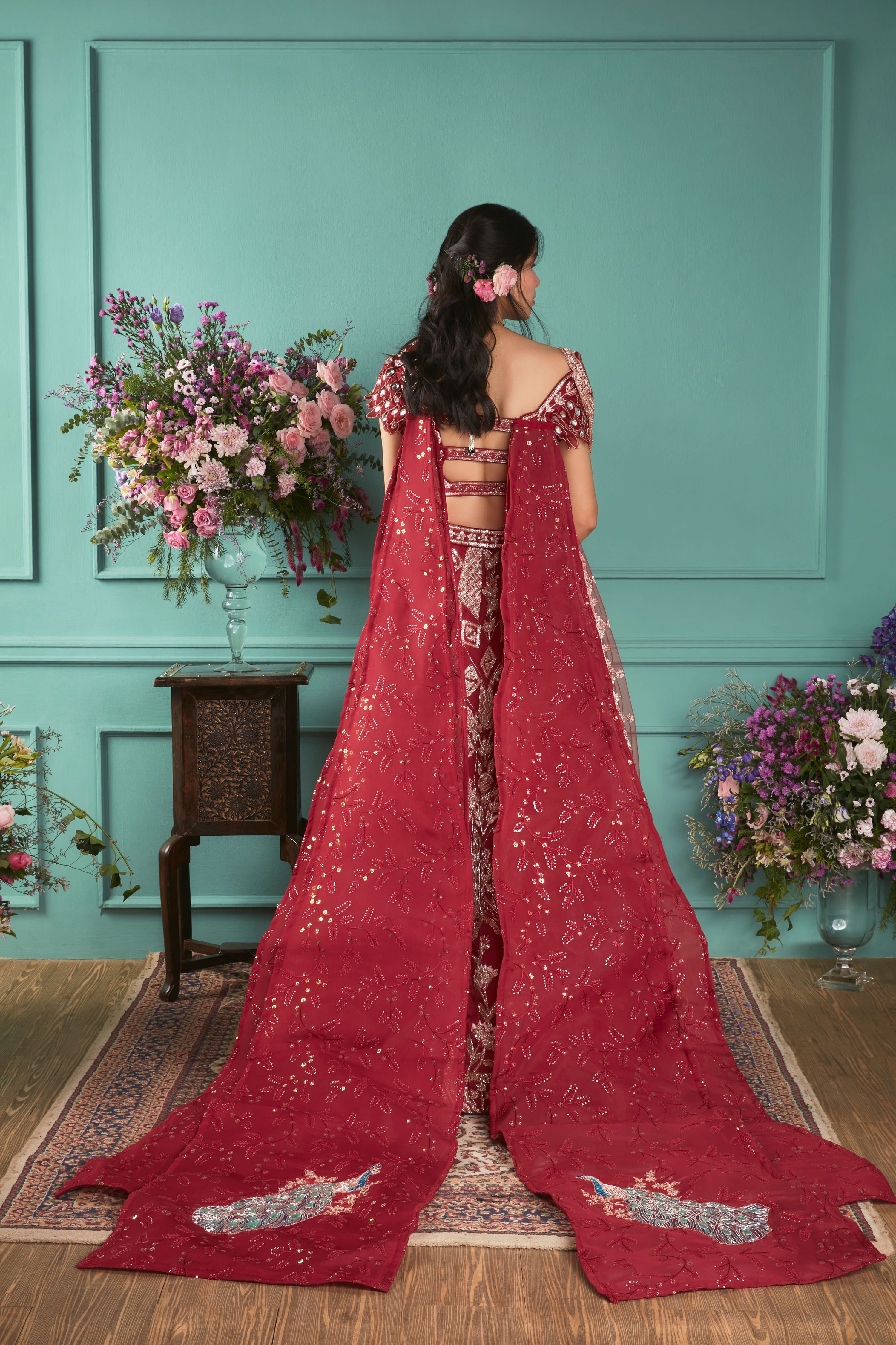 RED LEHENGA WITH PEACOCKS