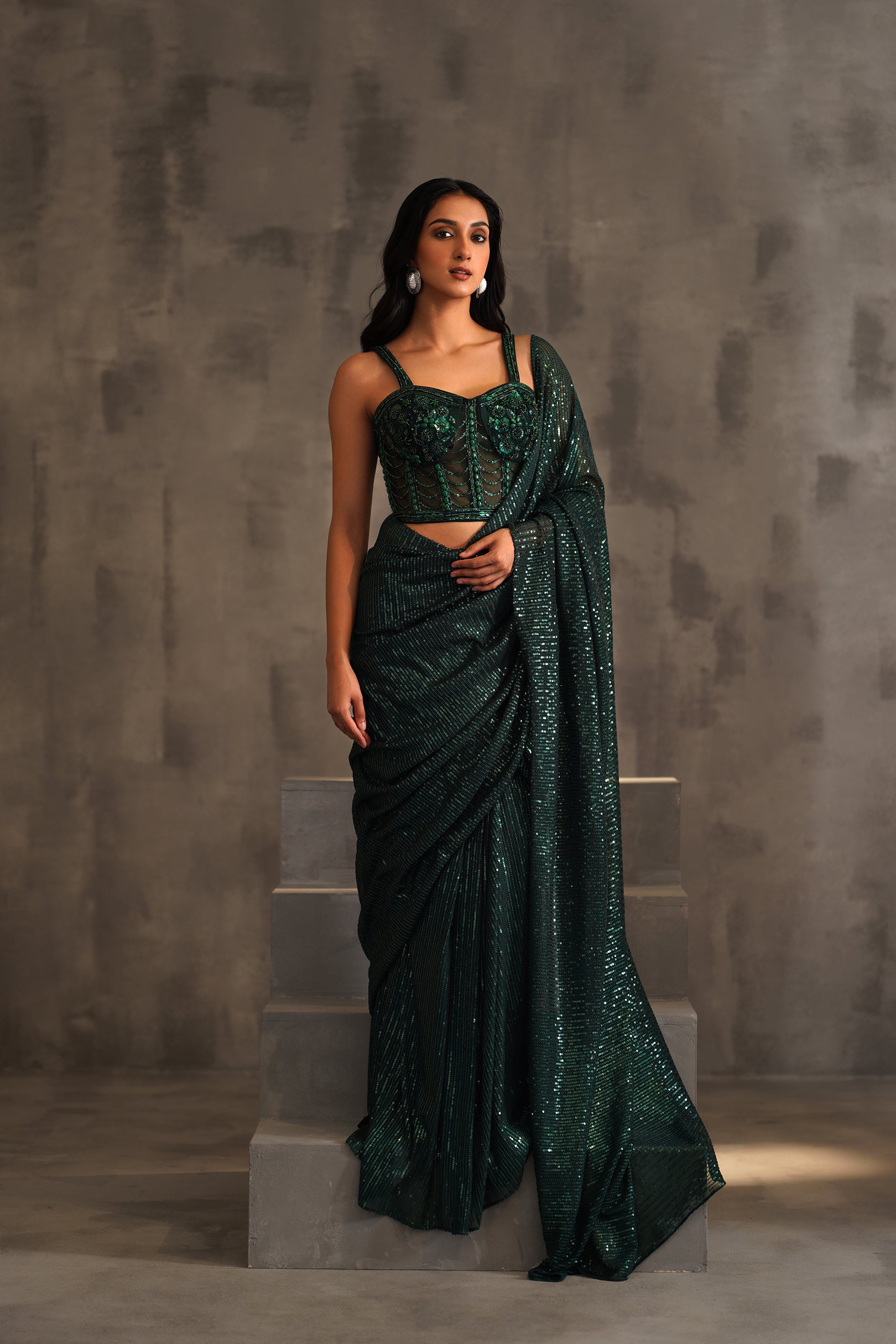 BOTTLE GREEN EMBROIDERED CORSET AND DRAPE SAREE