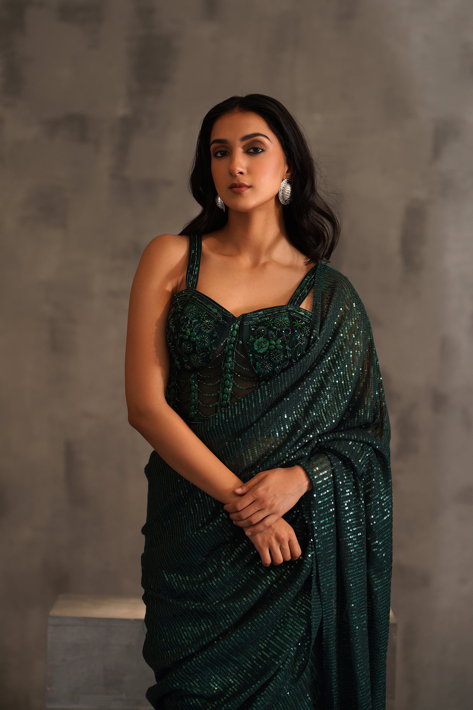 BOTTLE GREEN EMBROIDERED CORSET AND DRAPE SAREE