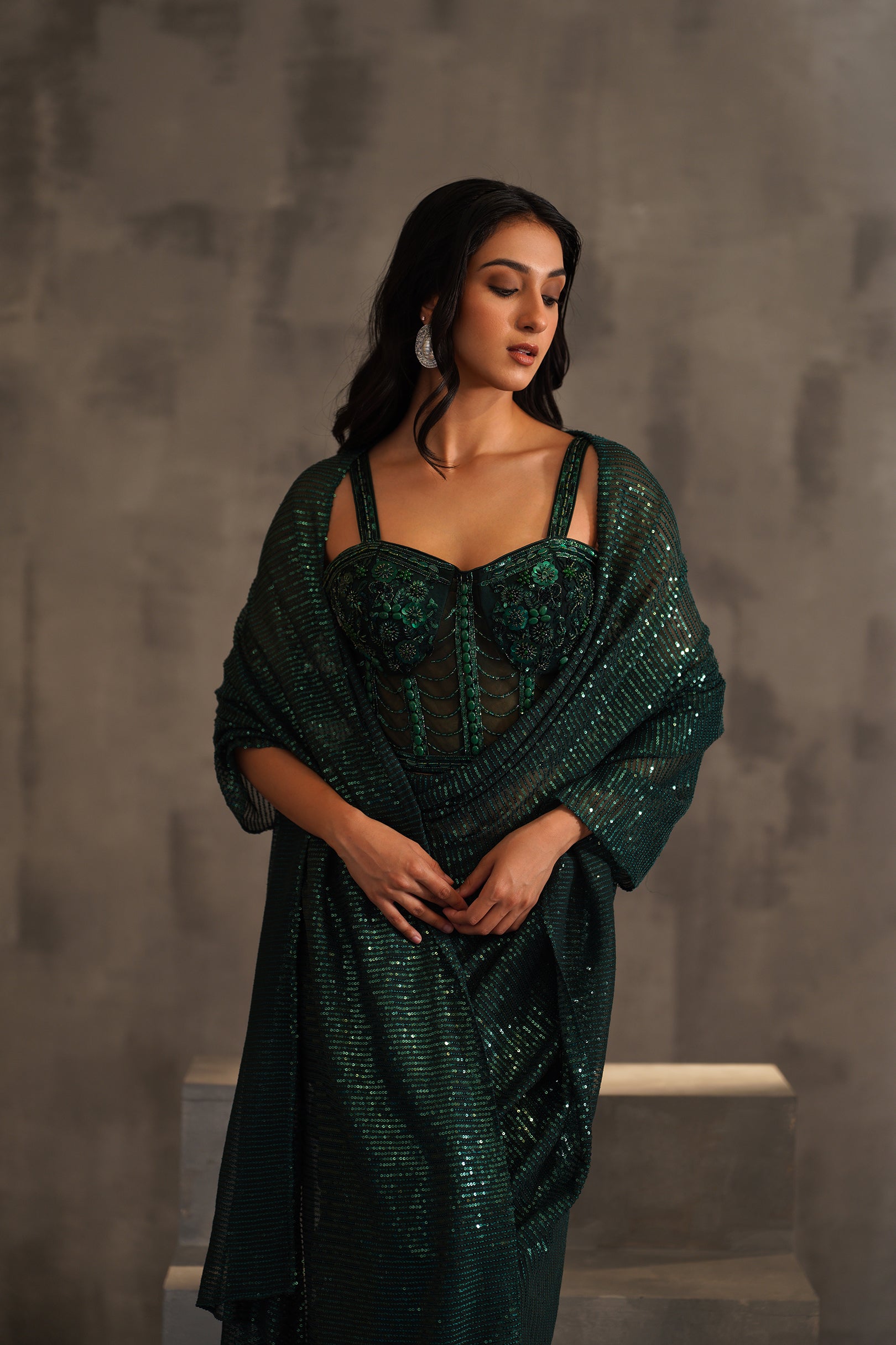 BOTTLE GREEN EMBROIDERED CORSET AND DRAPE SAREE