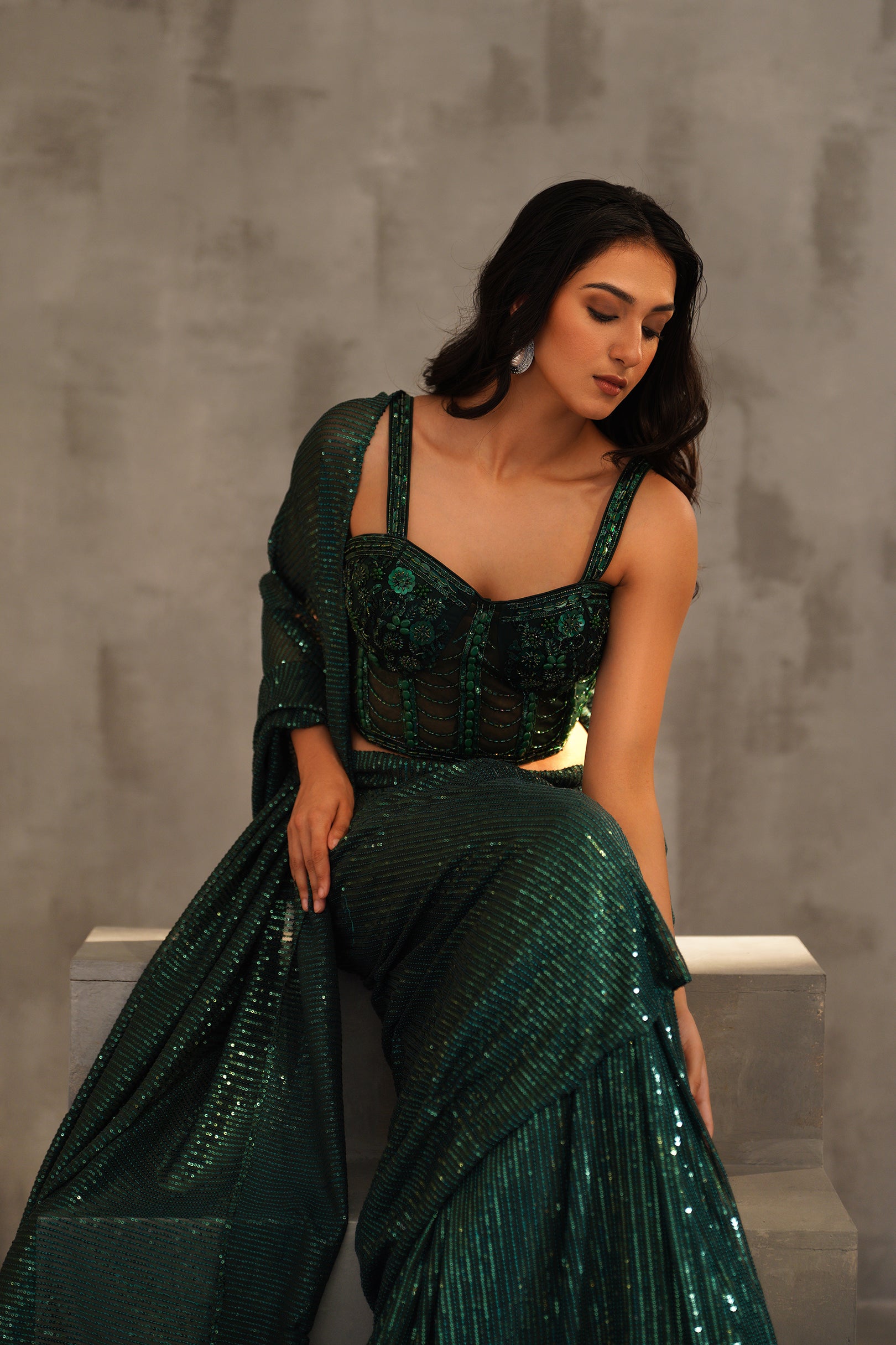 BOTTLE GREEN EMBROIDERED CORSET AND DRAPE SAREE