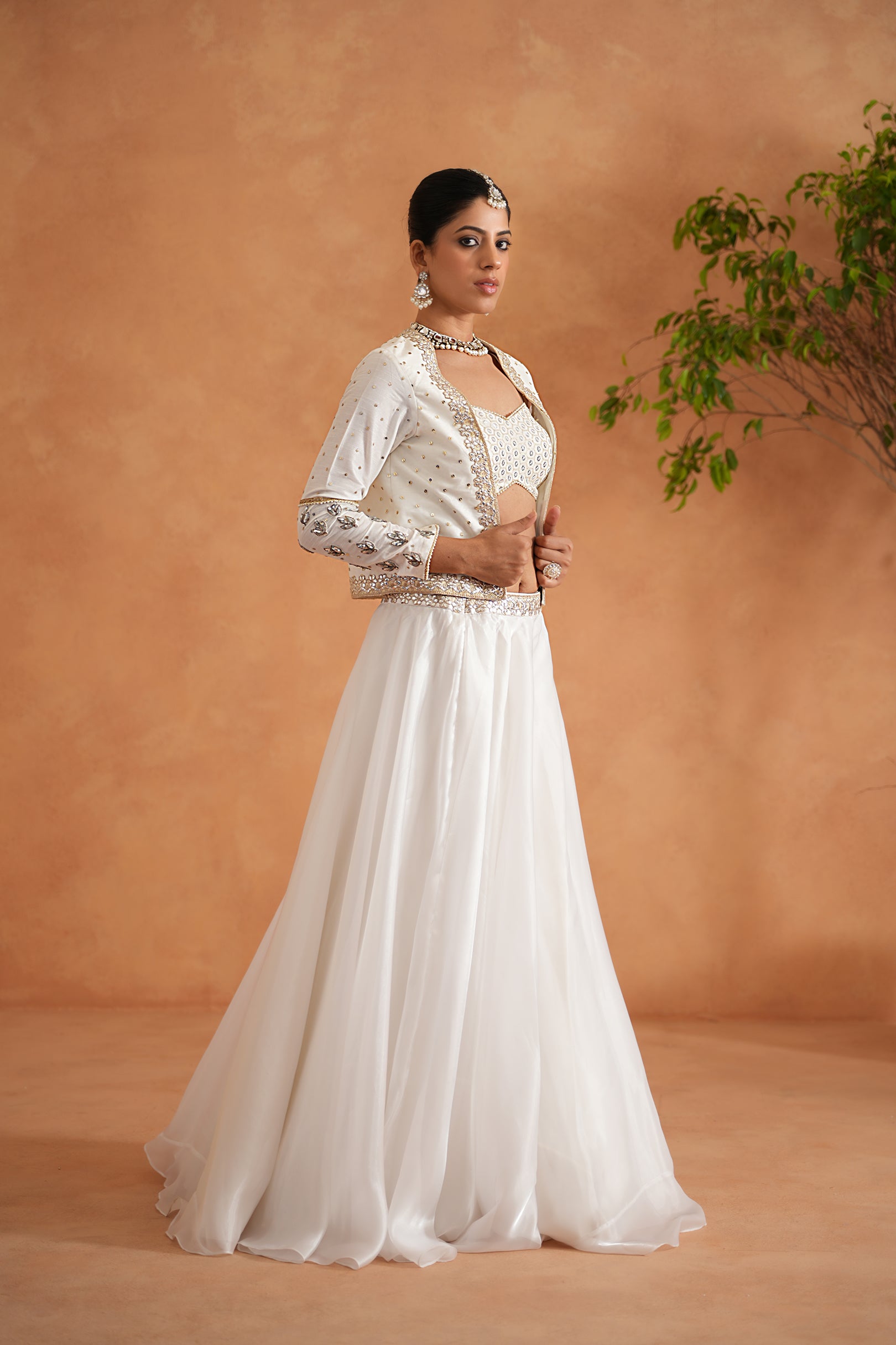 IVORY EMBROIDERED BUSTIER, LEHENGA AND SHORT JACKET