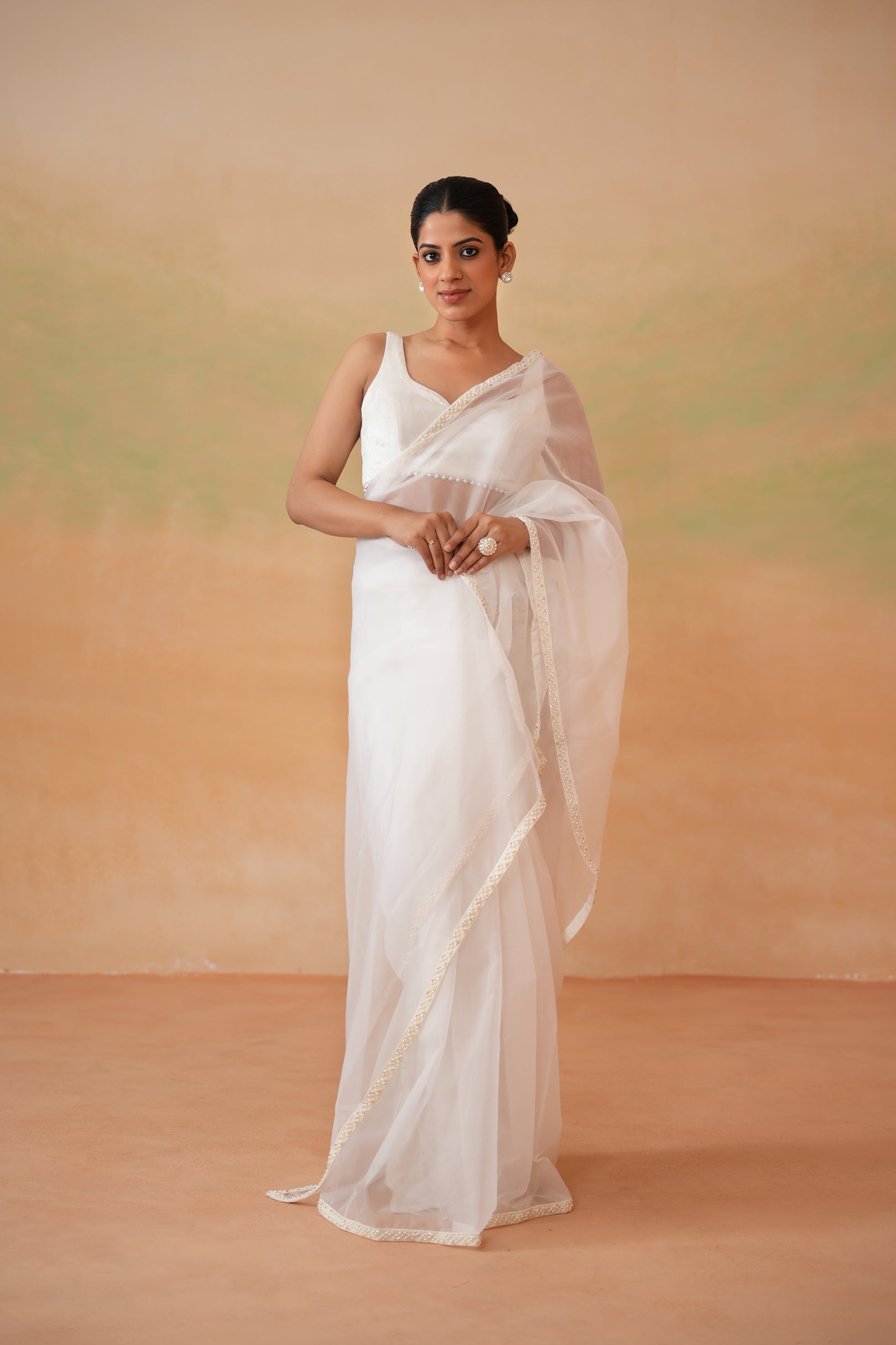 IVORY BLOUSE, STITCHED SAREE