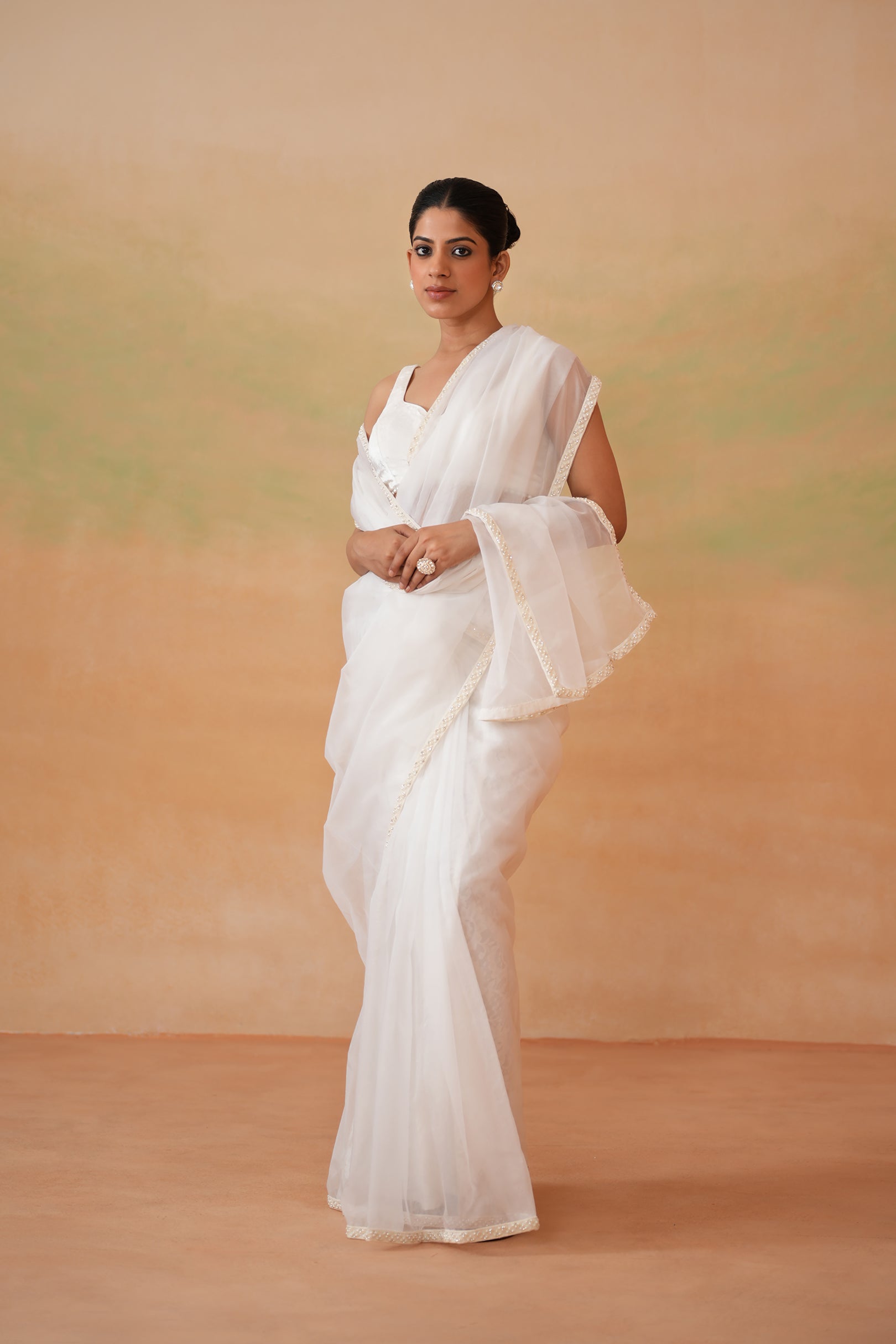 IVORY BLOUSE, STITCHED SAREE