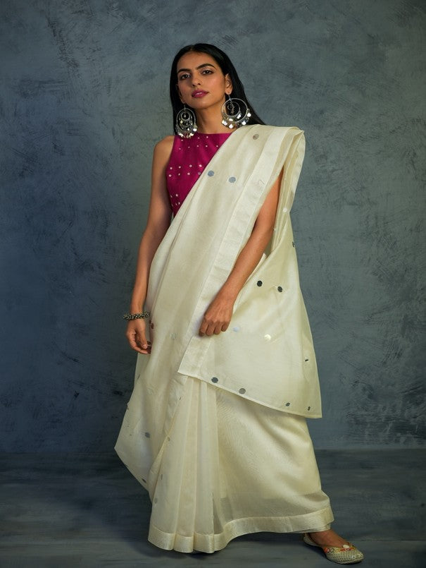 CHANDERI OFF WHITE SARI WITH PINK SLEEVELESS BLOUSE