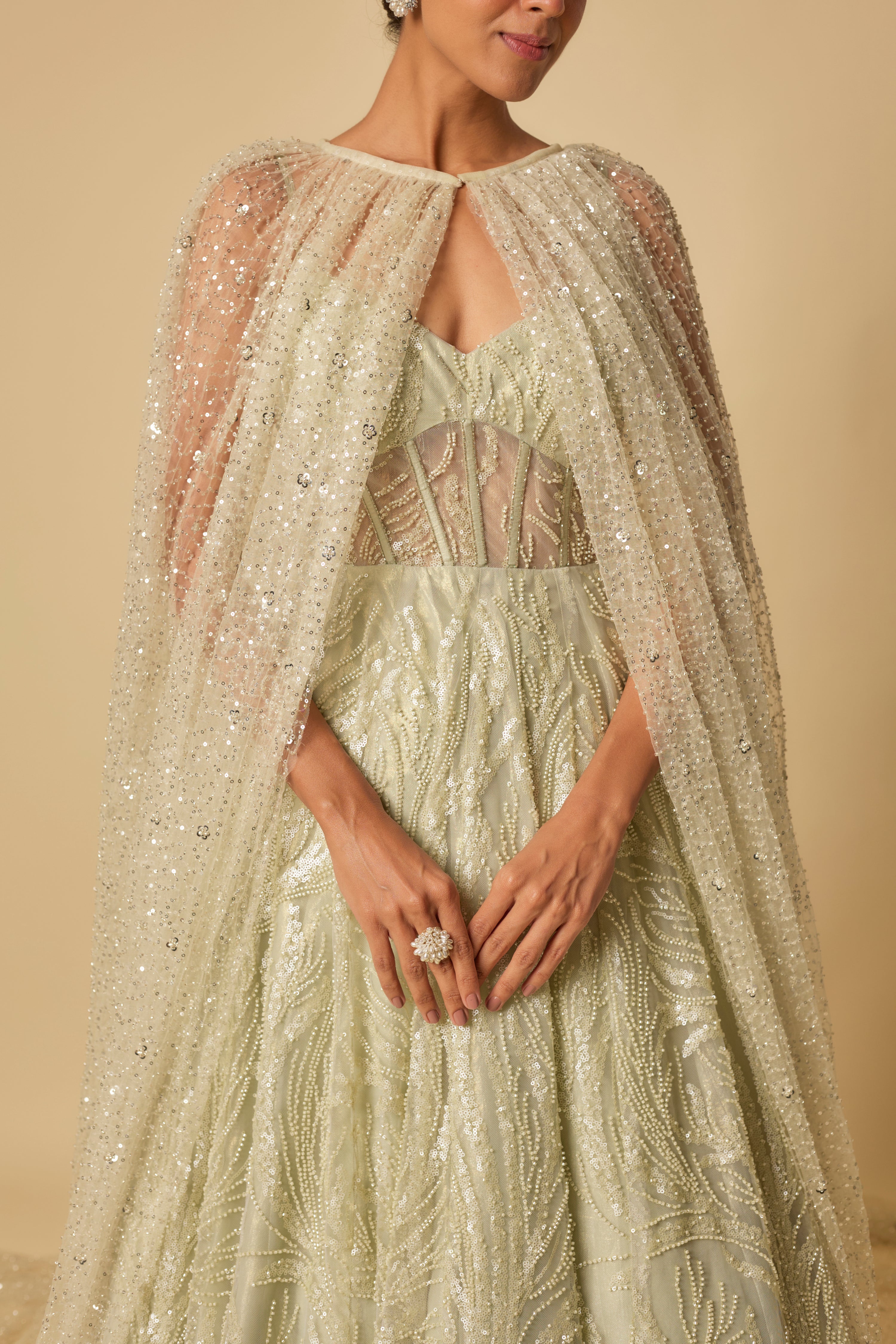SAGE GREEN EMBROIDERED GOWN WITH LONG CAPE