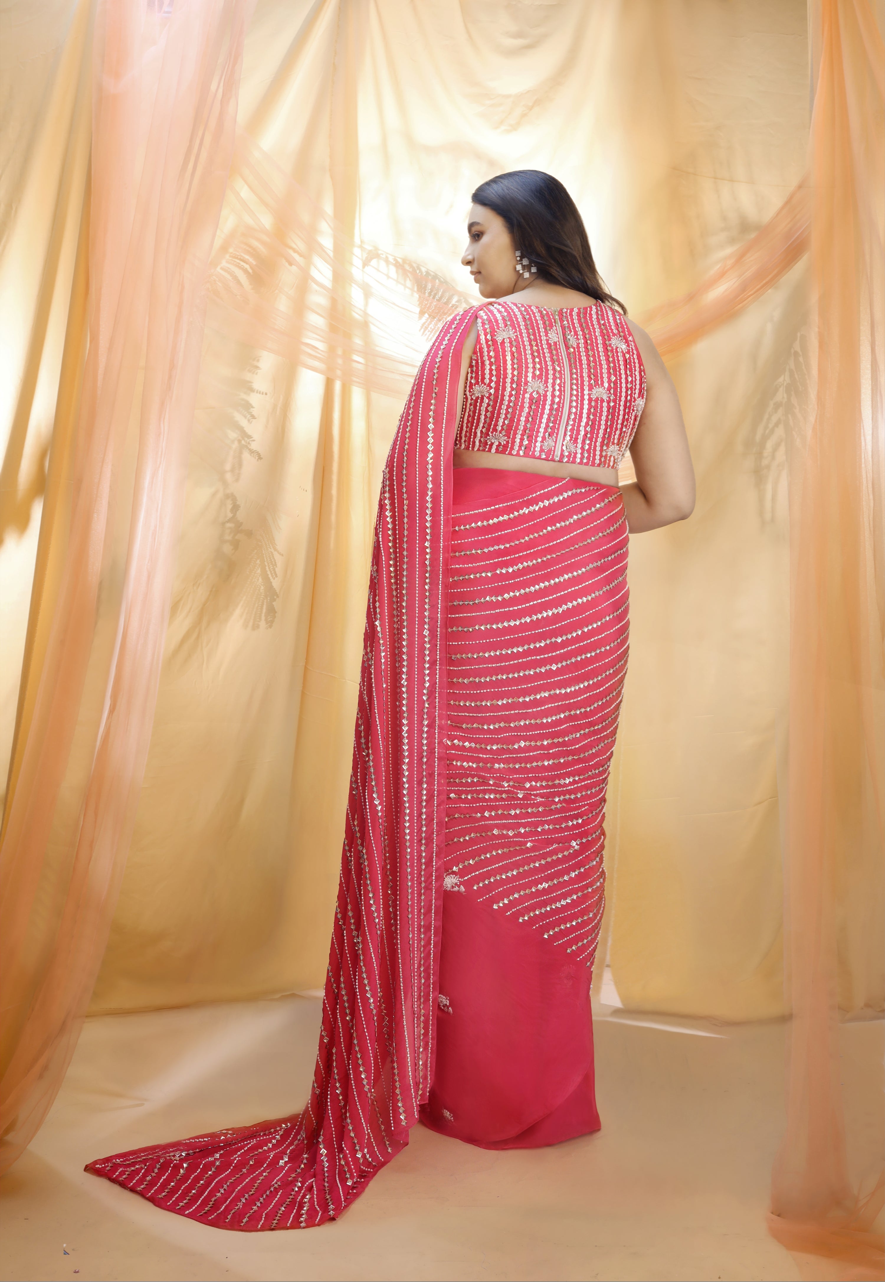 HOT PINK SAREE WITH SLEEVELESS BLOUSE