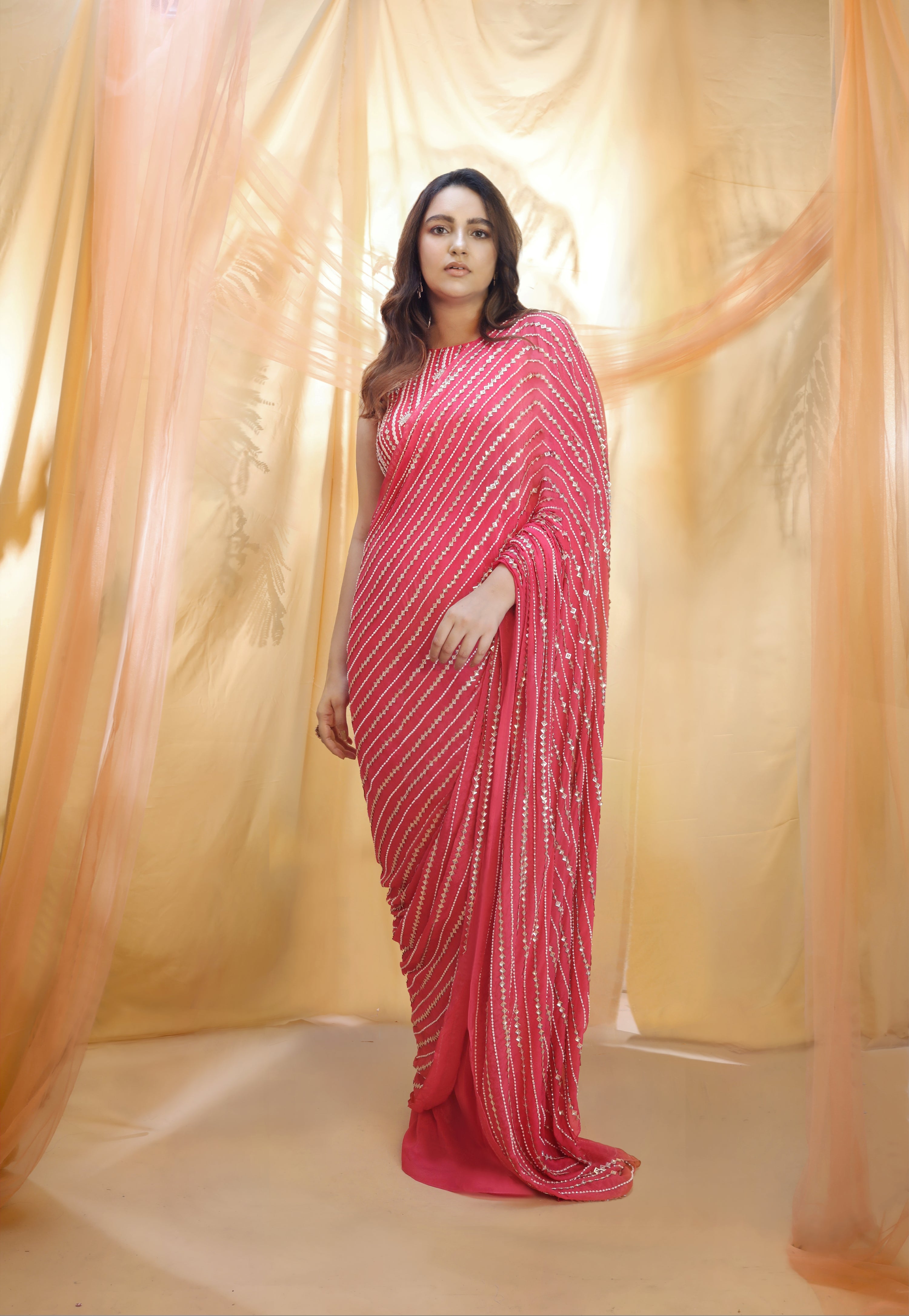 HOT PINK SAREE WITH SLEEVELESS BLOUSE