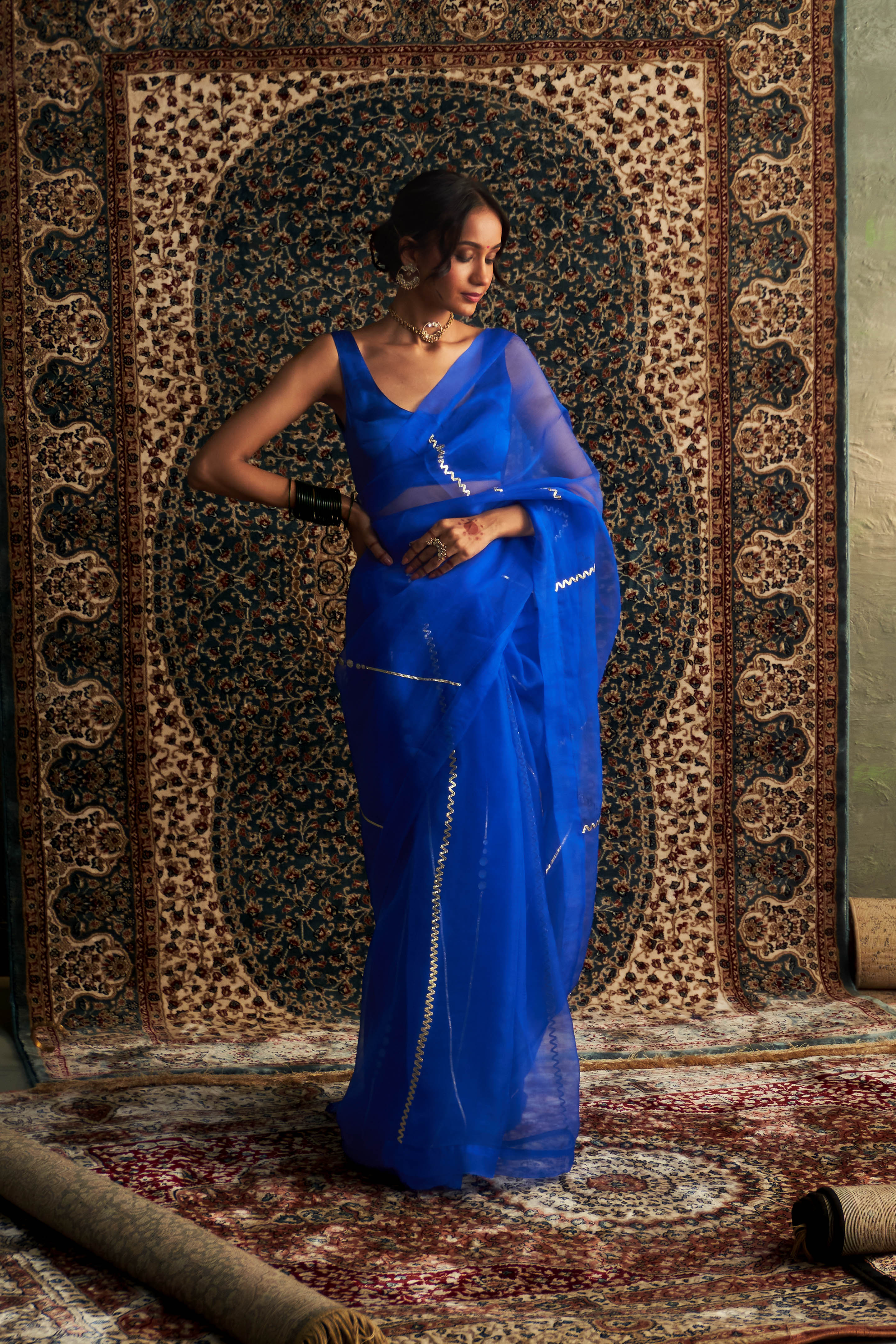 PRARAMBH EMBROIDERED ORGANZA SAREE WITH BLUE SLEEVELESS BLOUSE