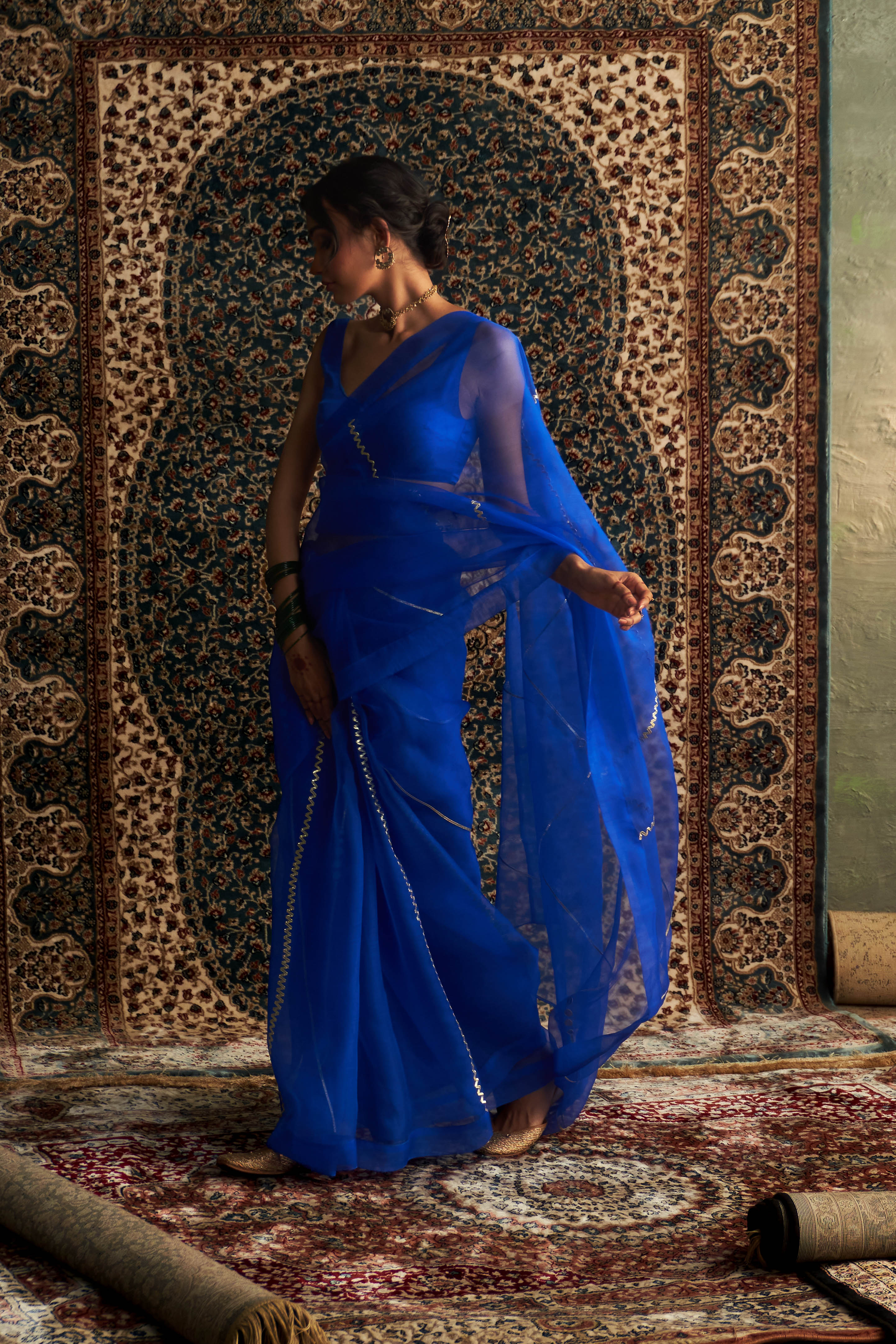 PRARAMBH EMBROIDERED ORGANZA SAREE WITH BLUE SLEEVELESS BLOUSE