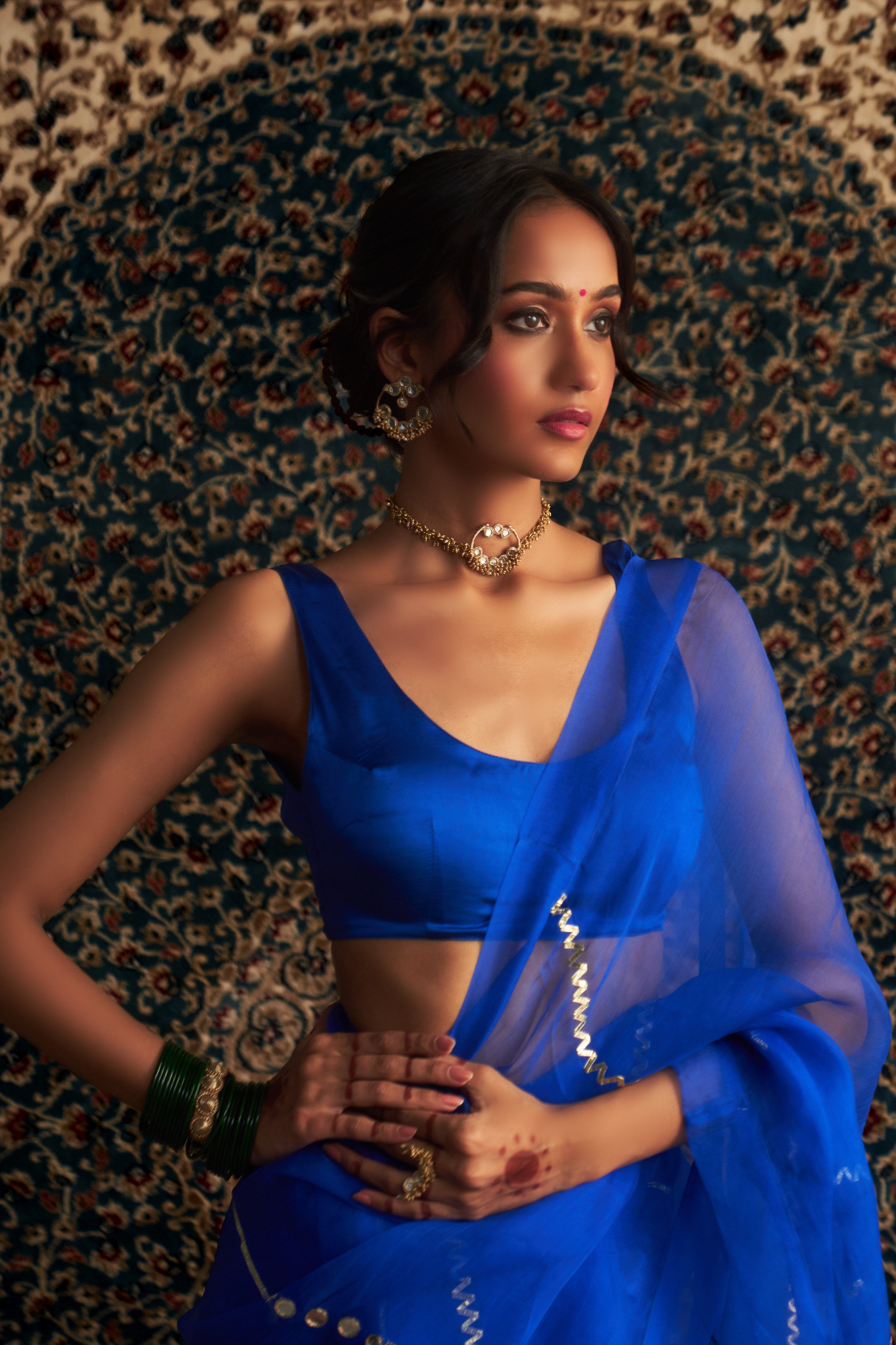 PRARAMBH EMBROIDERED ORGANZA SAREE WITH BLUE SLEEVELESS BLOUSE