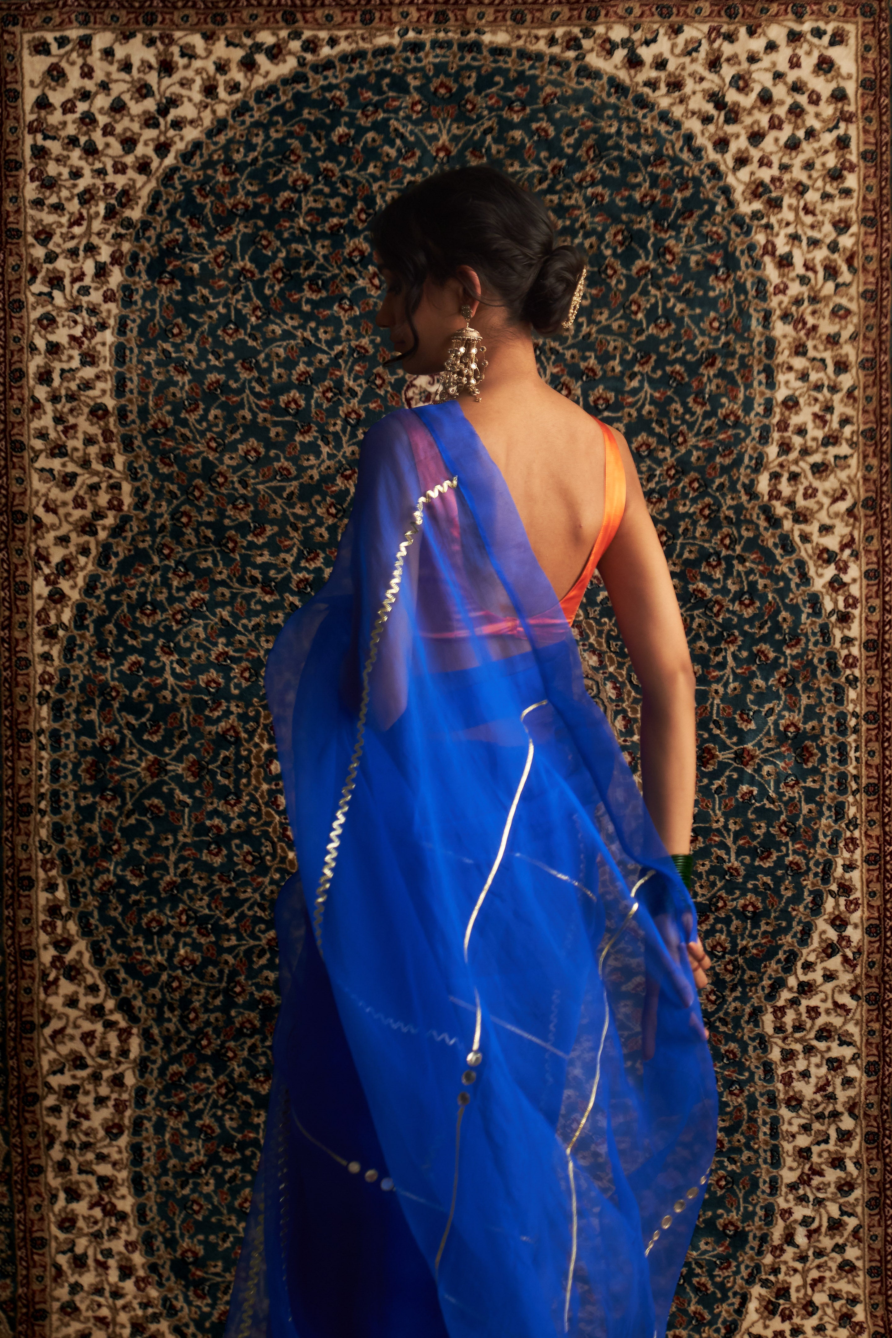 PRARAMBH EMBROIDERED ORGANZA SAREE WITH SAFFRON SLEEVELESS BLOUSE