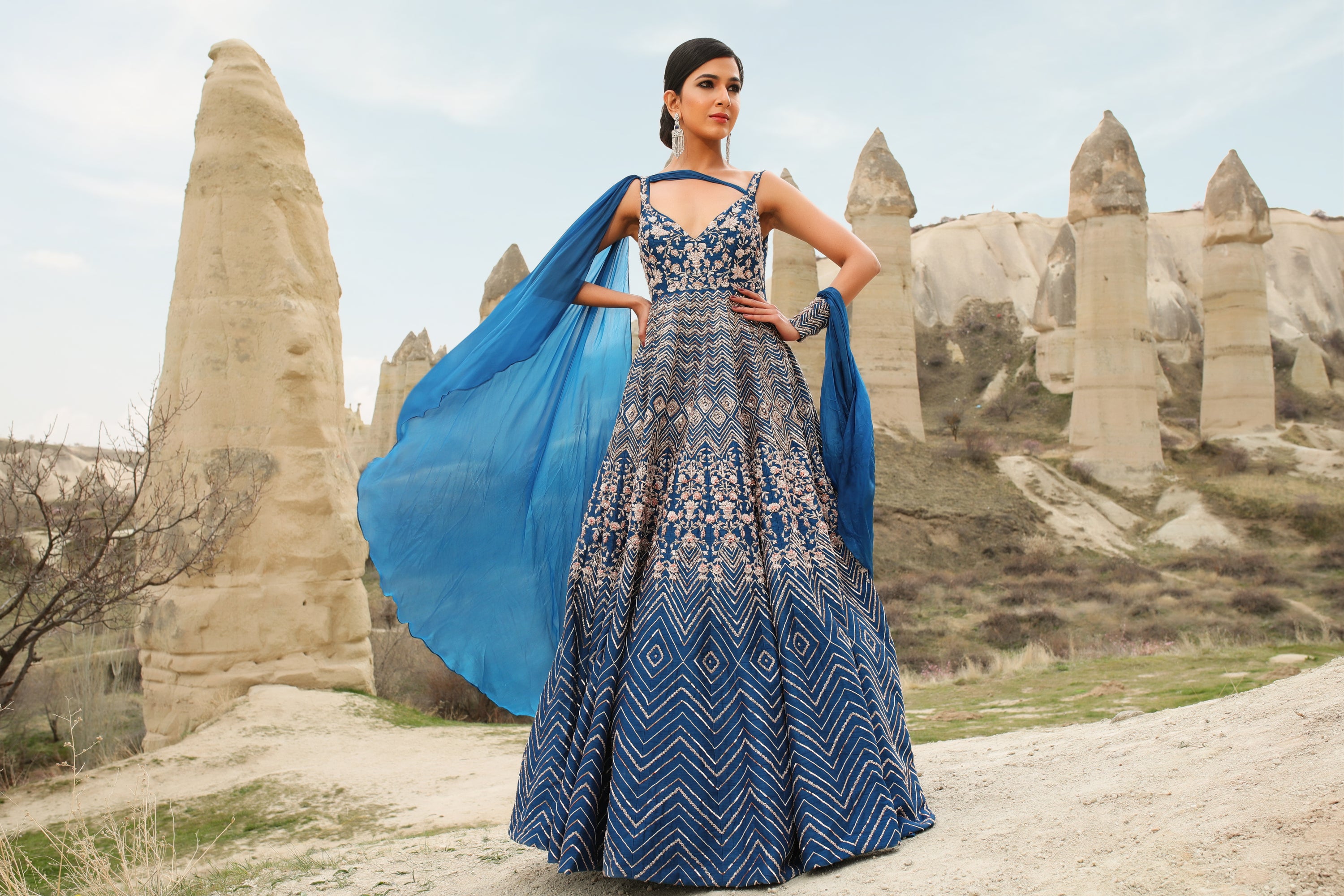 BLUE EMBROIDERED GOWN WITH DRAPE