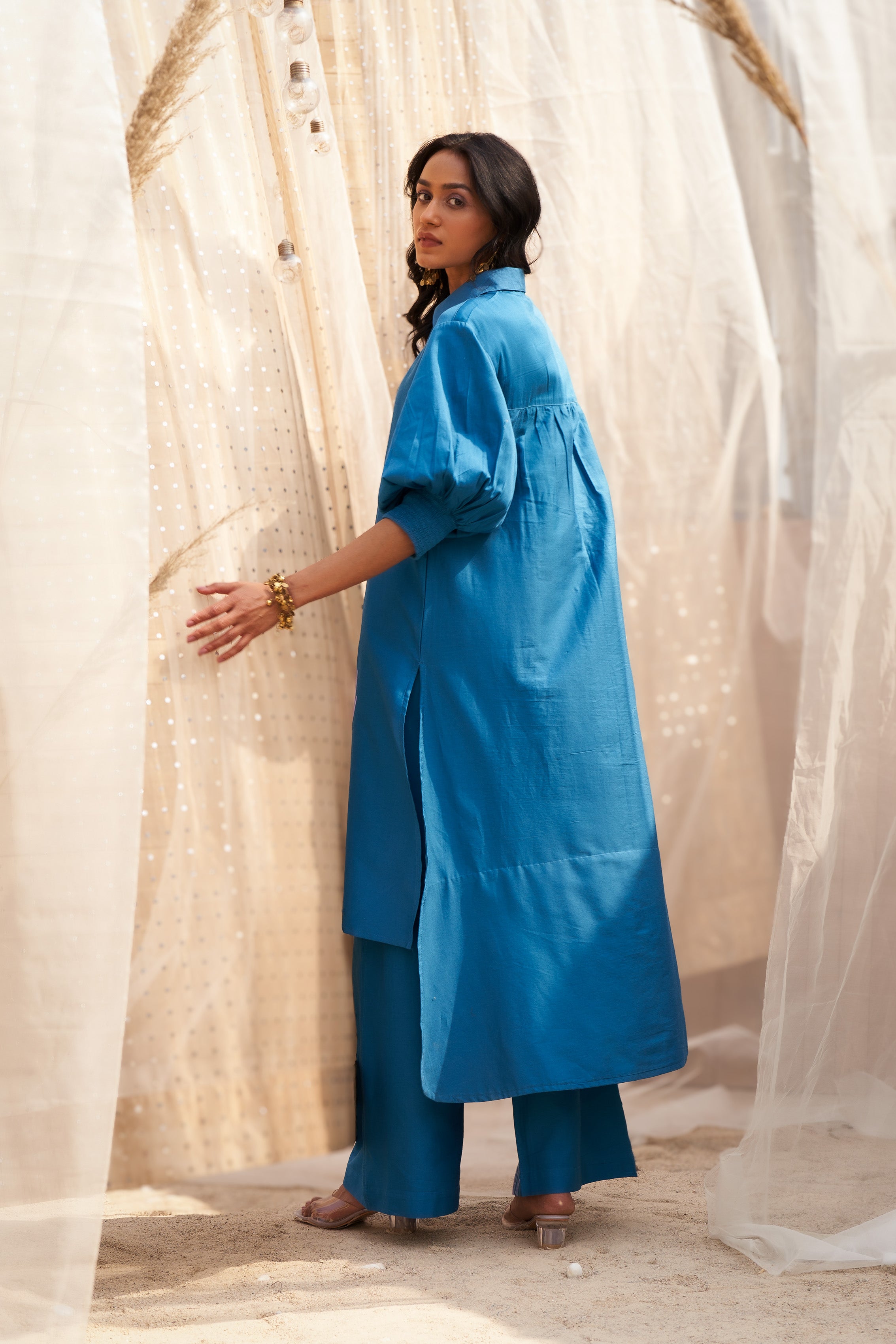 STATEMENT LEAF-PRINT CO-ORD SET WITH COLLARED KURTA & FLARED PANTS