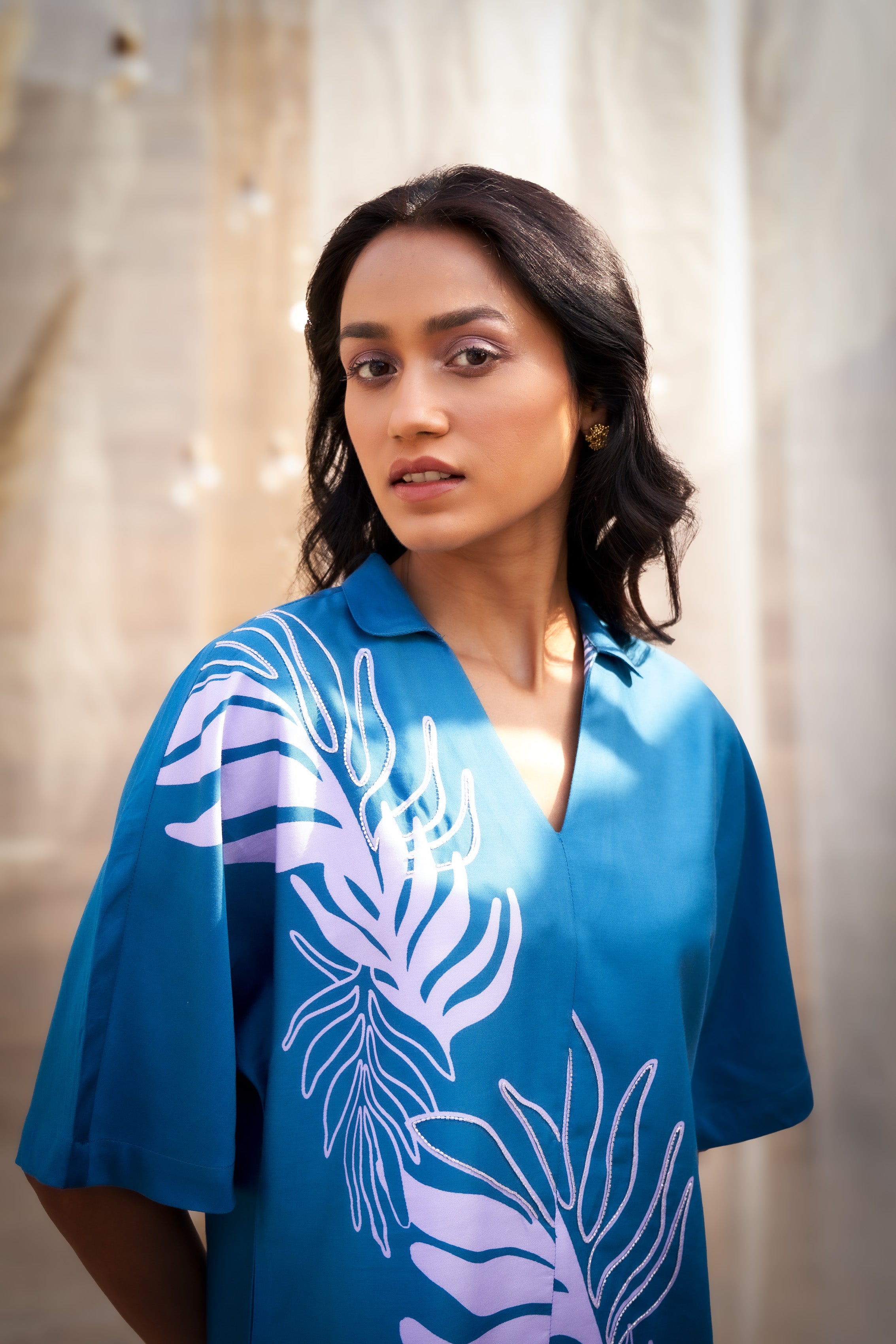STYLISH BIG LEAF-PRINT CO-ORD SET WITH V NECKLINE & BOOT-CUT PANTS